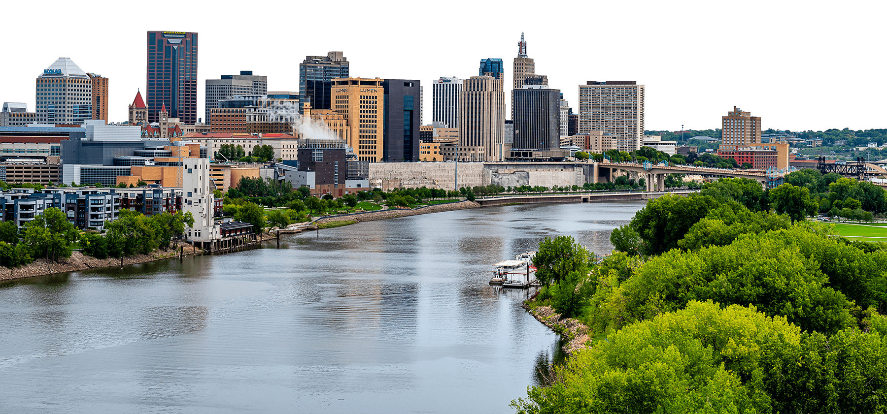 Saint Paul skyline with the Mississippi River in the foreground.